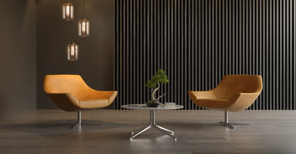 arhcitectural-cladding-2 Two orange lounge chairs beside a round table in a modern seating area